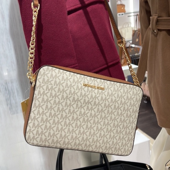Michael Kors Handbags - Michael Kors Jet Set Item Large East West Zip Crossbody Vanilla Signature